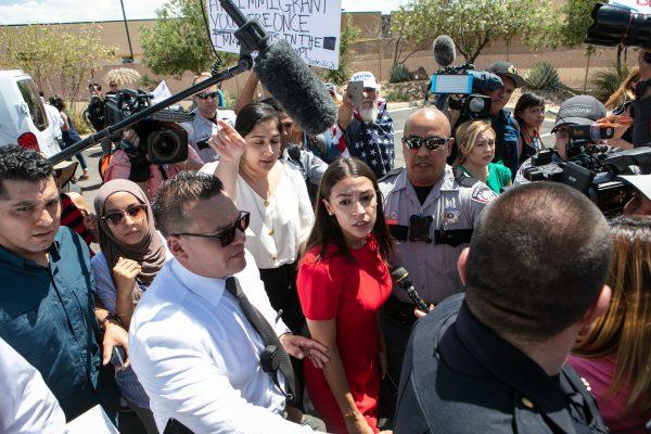 Rep. Alexandria Ocasio-Cortez (D-NY) is swarmed by the media after touring the Clint, TX Border Patrol Facility housing children in in Clint, Texas on July 1, 2019. (Christ Chavez/Getty Images)