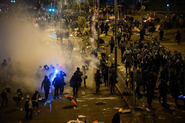 Police fire tear gas at protesters near the government headquarters in Hong Kong early on July 2, 2019. (ANTHONY WALLACE/AFP/Getty Images)