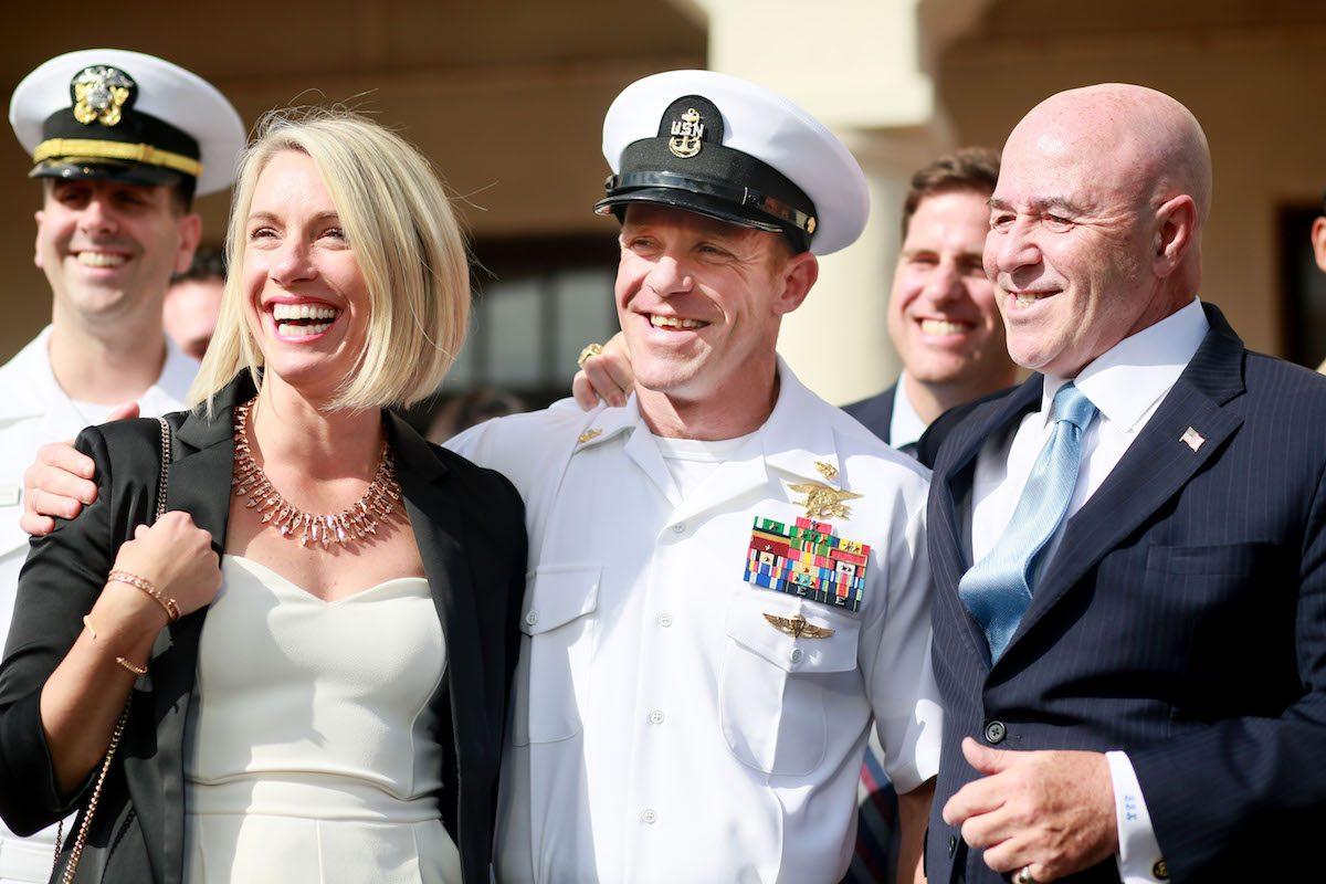 Navy Special Operations Chief Edward Gallagher (C) and his wife Andrea celebrate after being acquitted of all but one charge in San Diego, Calif., on July 2, 2019. (Sandy Huffaker/Getty Images)
