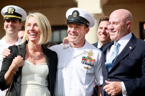 Navy Special Operations Chief Edward Gallagher and his wife Andrea celebrate after being acquitted of all but one charge in San Diego, Calif., on July 2, 2019. (Sandy Huffaker/Getty Images)