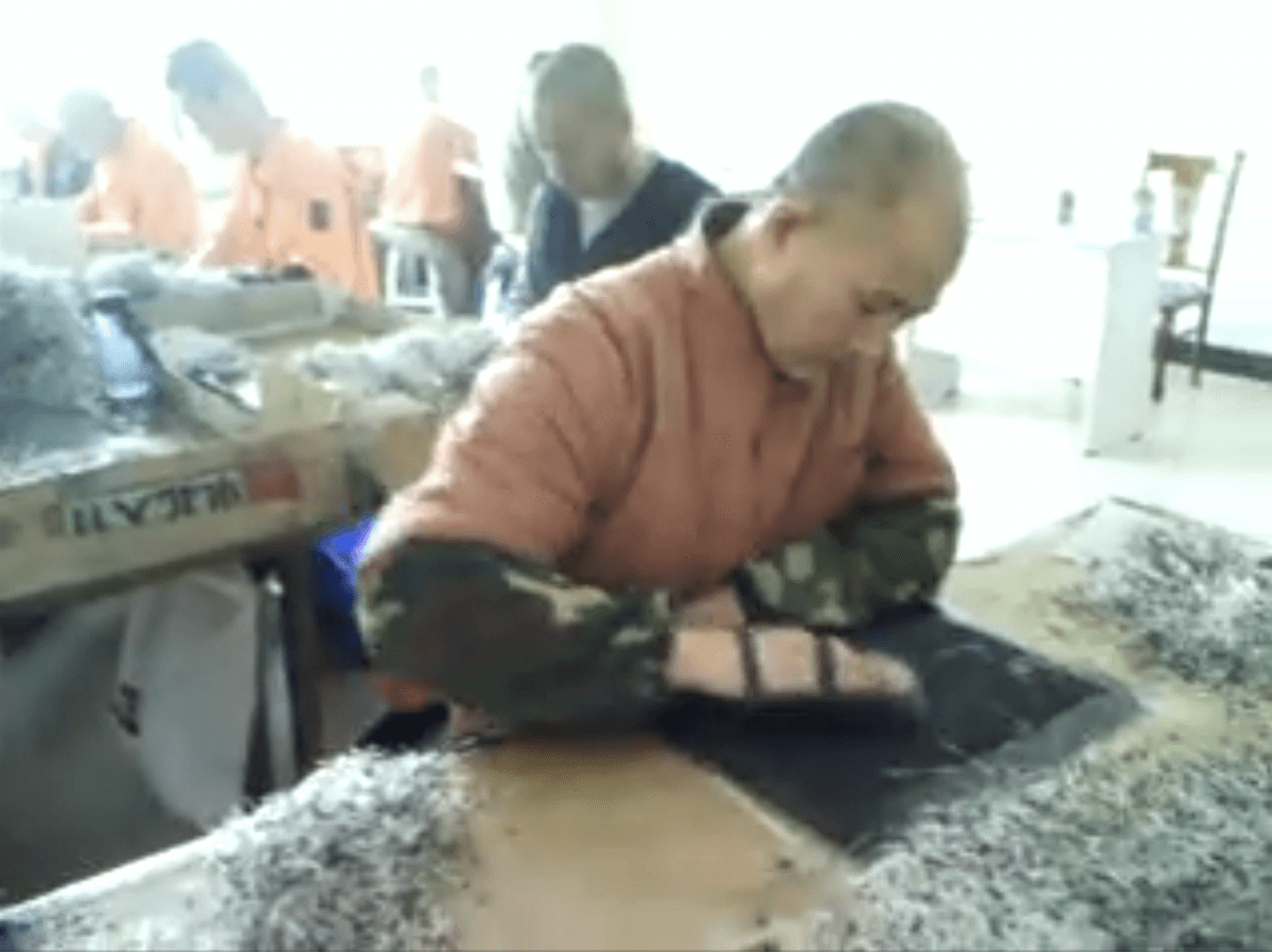 Undercover footage from the Masanjia labor camp in China shows inmates making diodes during the 2008 Beijing Olympics. (Courtesy of Yu Ming)
