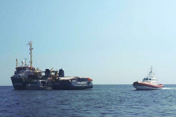 An Italian Coast Guard boat patrols next to the Sea-Watch 3 vessel in the Mediterranean Sea just off the coasts of the southern Italian island of Lampedusa, on June 27, 2019. (ANSA/Matteo Guidelli via AP)