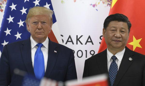 President Donald Trump, poses for a photo with Chinese leader Xi Jinping during a meeting on the sidelines of the G-20 summit in Osaka, Japan on June 29, 2019. (AP Photo/Susan Walsh)