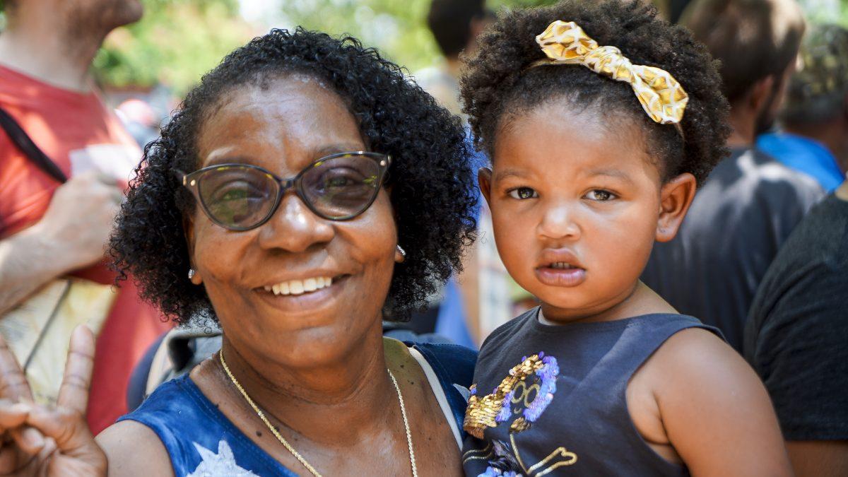 Denise Bannister of Winston, North Carolina, with her granddaughter at the July 4th parade in Washington, D.C. on July 4, 2019. (Holly Kellum/The Epoch Times)