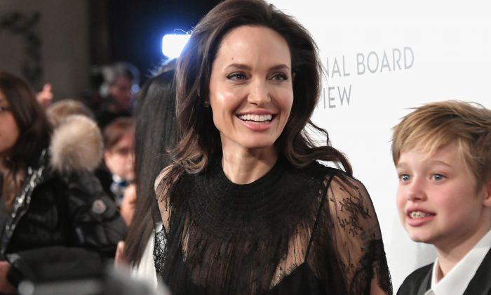 Twins Stand on Roadside Selling Giant Bear. An Hour Later, Angelina Jolie Stops By
