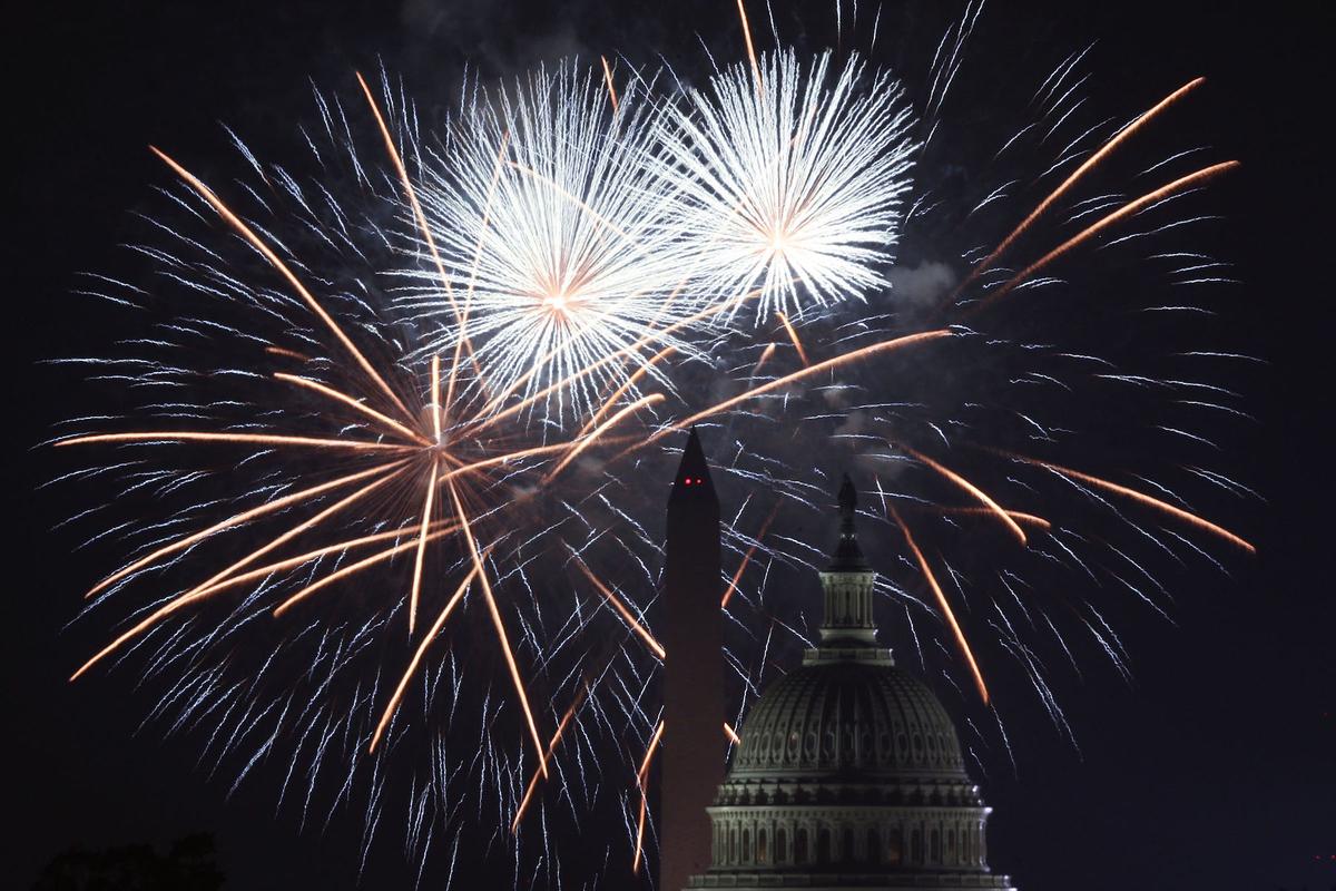Fireworks explode overhead at the U.S. Capitol and the Washington Monument on Independence Day in Washington on July 4, 2018. (Alex Wong/Getty Images/File).