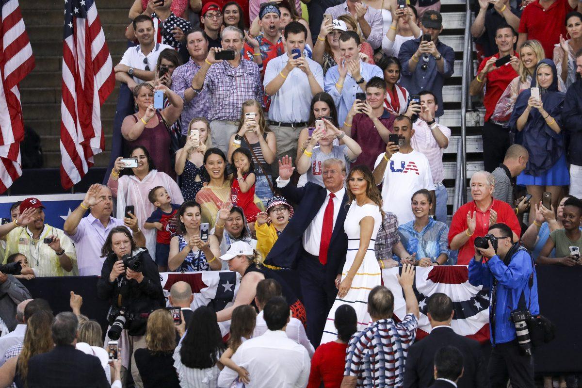 President Donald Trump and First Lady Melania Trump leave the stage after the “Salute to America” event in front of the Lincoln Memorial in Washington, on July 4, 2019. (Charlotte Cuthbertson/The Epoch Times)