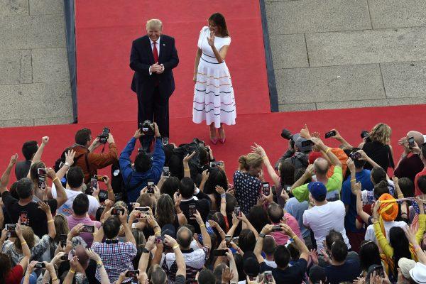 President Donald Trump and First Lady Melania Trump wave to the crowd as they arrive to the "Salute to America" Fourth of July event at the Lincoln Memorial in Washington on July 4, 2019. (Susan Walsh/AFP/Getty Images)