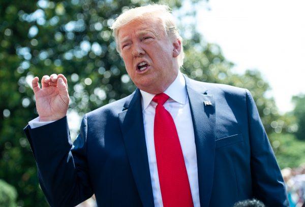 President Donald Trump speaks to the media as he walks to Marine One prior to departing from the South Lawn of the White House in Washington on July 5, 2019. (Saul Loeb/AFP/Getty Images)