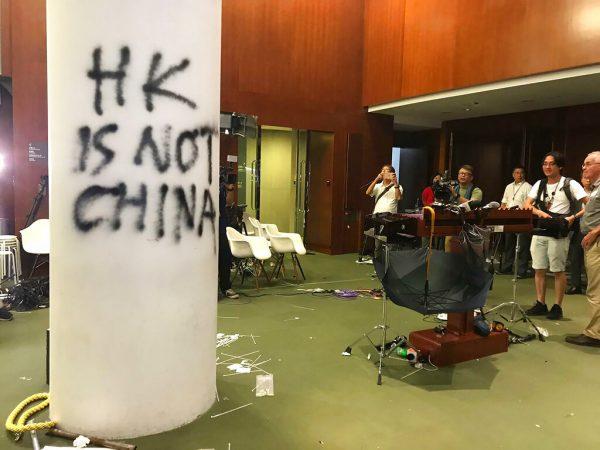 Damage to the Legislative Council following a break-in by protesters is seen during a media tour in Hong Kong on July 3, 2019. (Johnson Lai/AP Photo)