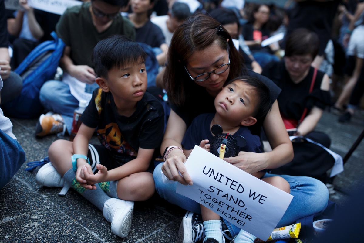 People attend a gathering of Hong Kong mothers to show their support for the city’s young pro-democracy protesters in Hong Kong, China on July 5, 2019. (Thomas Peter/Reuters)