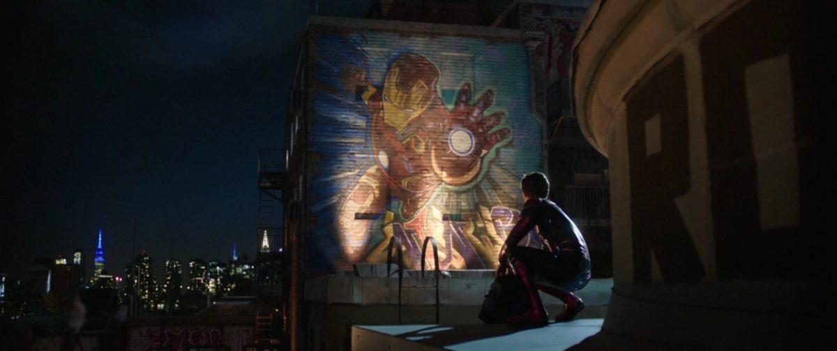 Tom Holland as Spider-Man contemplating a mural of Iron Man in Columbia Pictures’ “Spider-Man: Far From Home.”