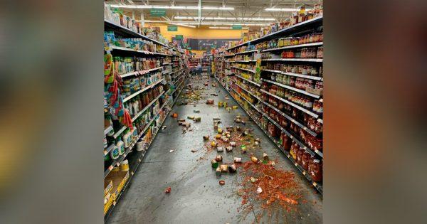 Food that fell from the shelves litters the floor of an aisle at a Walmart following an earthquake in Yucca Yalley, Calif., on July 5, 2019. (Chad Mayes via AP)