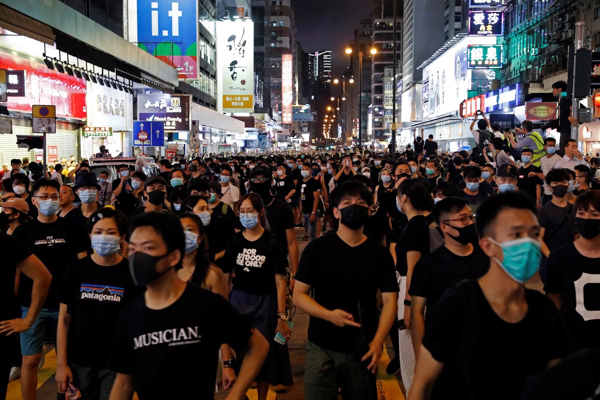 Anti-extradition bill protesters march at Hong Kong's tourism district Nathan Road near Mongkok, China on July 7, 2019. (Tyrone Siu/Reuters)