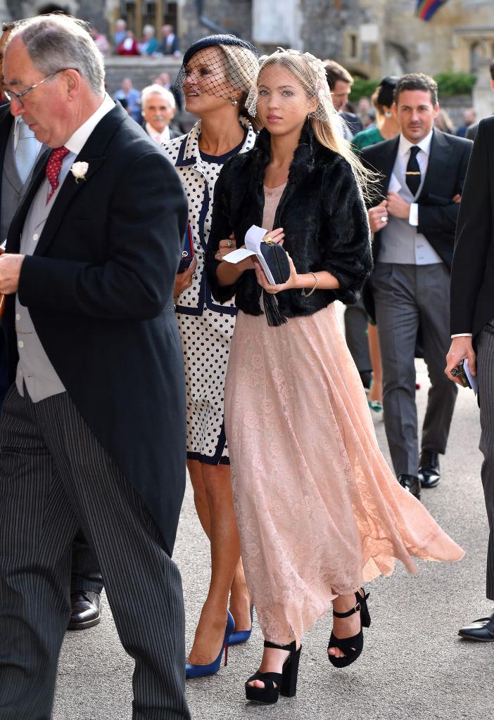 Kate and Lila Moss dressed to impress at the wedding of Princess Eugenie of York and Mr. Jack Brooksbank in Windsor, England, 2018 (©Getty Images | <a href="https://www.gettyimages.com/detail/news-photo/kate-moss-and-lila-grace-moss-hack-ahead-of-the-wedding-of-news-photo/1051950112">Matt Crossick - WPA Pool</a>)