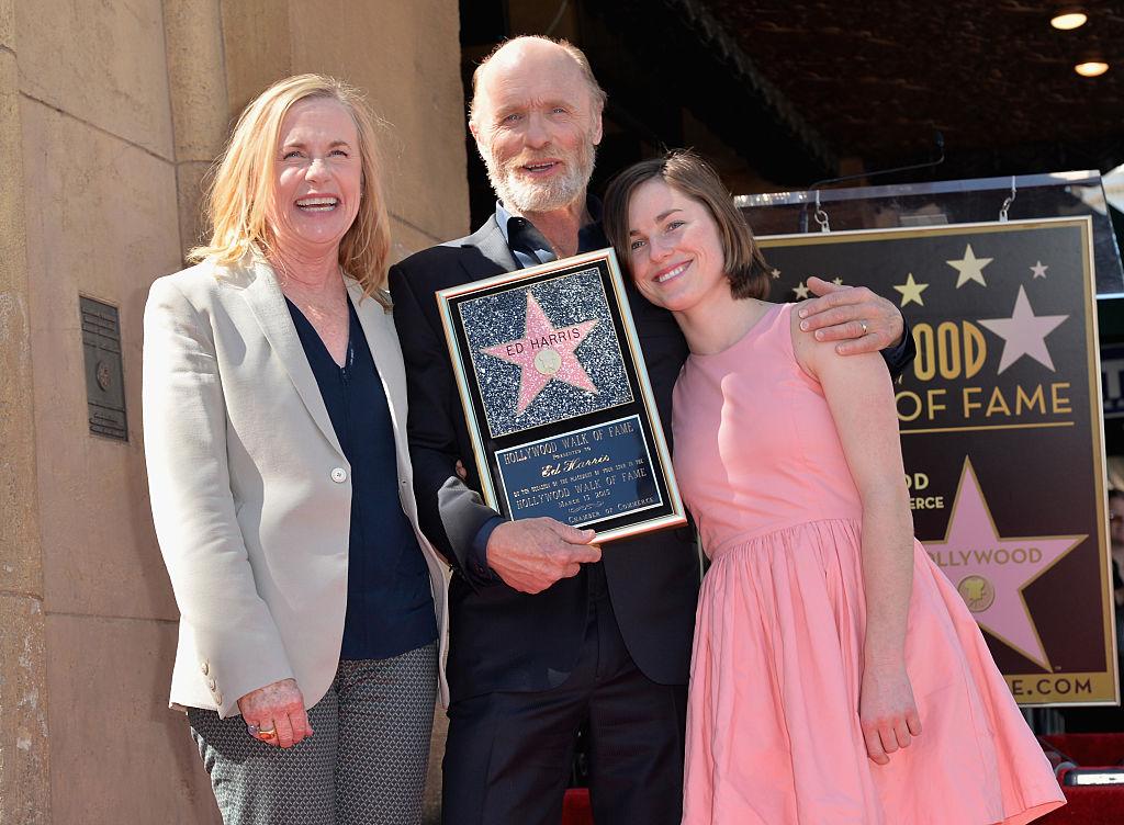 Amy Madigan, Ed Harris, and Lily stand proudly united as Ed's longevous career is honored (©Getty Images | <a href="https://www.gettyimages.com/detail/news-photo/actress-amy-madigan-actor-ed-harris-and-lily-harris-attend-news-photo/466118992">Alberto E. Rodriguez</a>)