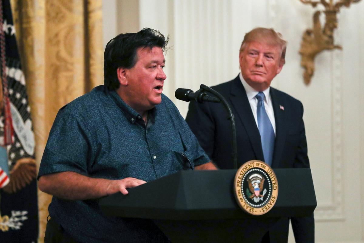 Bruce Roebuck, the owner of a bait and tackle business in Port St. Lucie, Fla., speaks at President Donald Trump’s environment initiatives event in the East Room of the White House in Washington on July 8, 2019. (Charlotte Cuthbertson/The Epoch Times)
