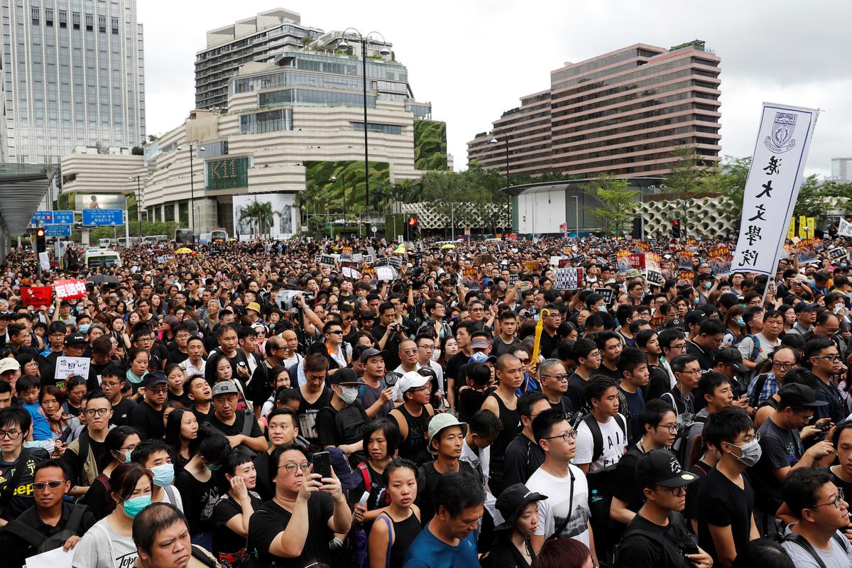 Anti-extradition bill protesters march to West Kowloon Express Rail Link Station at Hong Kong's tourism district Tsim Sha Tsui, China on July 7, 2019. (Tyrone Siu/Reuters)