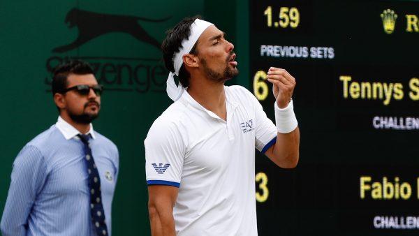 Italy's Fabio Fognini reacts as he plays United States' Tennys Sandgren in a Men's singles match during day six of the Wimbledon Tennis Championships in London on July 6, 2019. (Alastair Grant/Photo/AP)