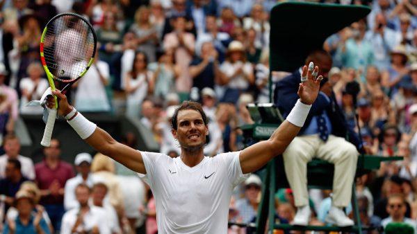 Spain's Rafael Nadal celebrates after beating Portugal's Joao Sousa in a Men's singles match during day seven of the Wimbledon Tennis Championships in London on July 8, 2019. (Alastair Grant/AP)