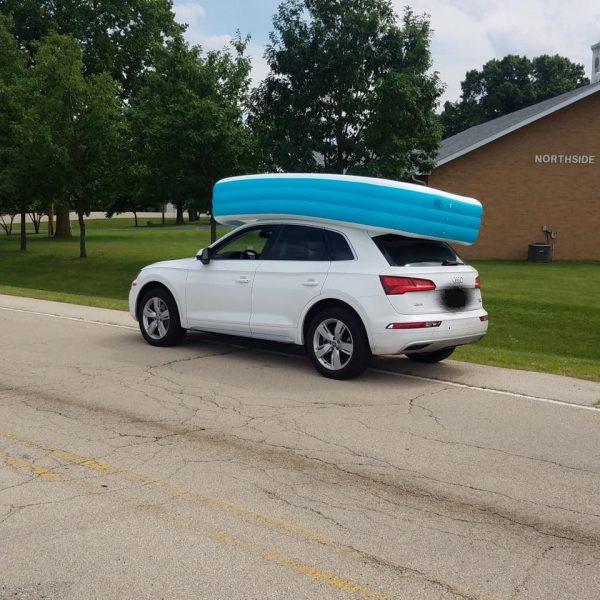 The white Audi Q5, which was pulled over with two children in the pool on the roof in Dixon, Illinois on July 9, 2019. (Dixon Police Department)
