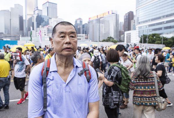 Hong Kong media tycoon and democracy campaigner Jimmy Lai joins a protest against a controversial extradition bill in Hong Kong on April 28, 2019. (Yu Gang/Epoch Times)