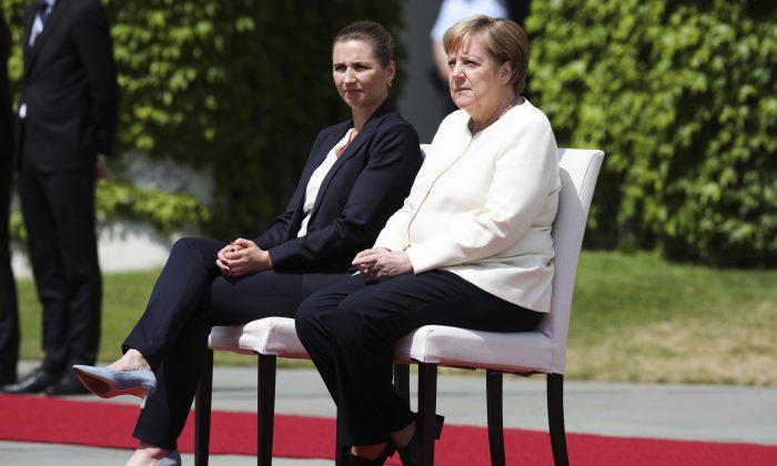 Germany’s Merkel Sits for Anthems After Shaking Episodes