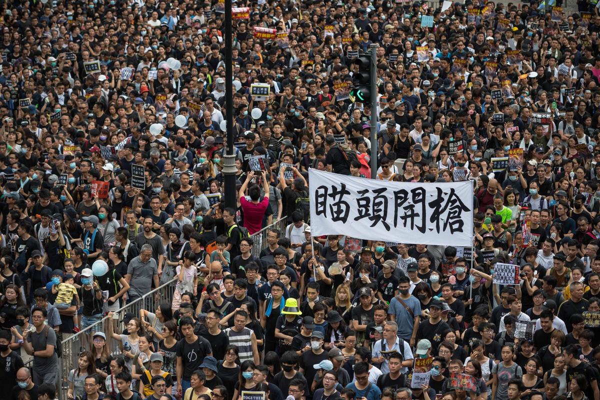 Protesters march towards the West Kowloon railway station during a protest against the proposed extradition bill in Hong Kong on July 7, 2019. Over 230,000 people rallied in Kowloon as pro-democracy demonstrators have continued on the streets of Hong Kong for the past month, calling for the complete withdrawal of a controversial extradition bill. (Billy H.C. Kwok/Getty Images)