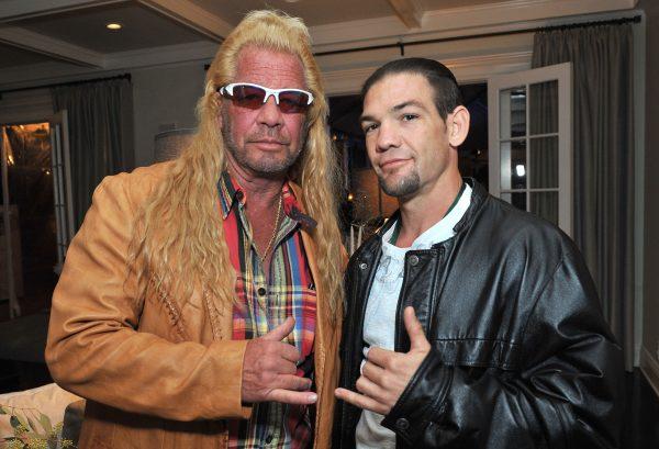 Duane "Dog the Bounty Hunter" Chapman (L)  and Leland Chapman attend the 2013 Electus College Humor Holiday Party in Los Angeles, Cali., on Dec. 12, 2013. (Angela Weiss/Getty Images for Electus)