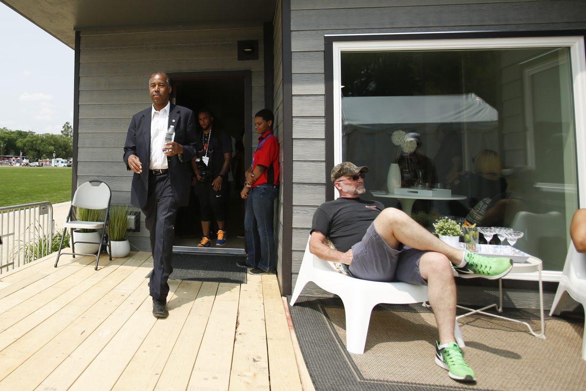 Secretary of Housing and Urban Development Ben Carson visits a house by indieDwell homebuilders at the Innovative Housing Showcase on the National Mall in Washington on June 1, 2019. (Samira Bouaou/The Epoch Times)