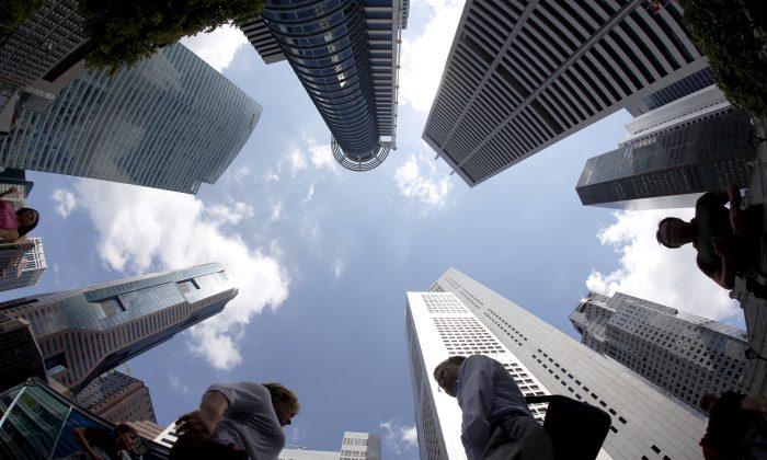 Singapore Cautions Wealth Managers on Aggressively Courting Hong Kong Business