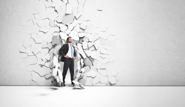 Are you ready to walk through walls to meet your commitment? If not, it's likely time to either uncommit or deepen your resolve. (Shutterstock)
