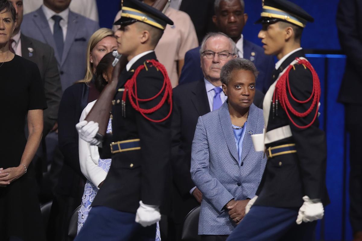 Lori Lightfoot watches the presentation of colors at her inauguration ceremony at the Wintrust Arena in Chicago, Illinois on May 20, 2019. (Photo by Scott Olson/Getty Images)