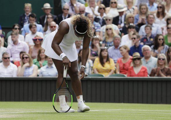 United States' Serena Williams is dejected after losing a point during the women's singles final match against Romania's Simona Halep on day twelve of the Wimbledon Tennis Championships in London, on July 13, 2019. (Kirsty Wigglesworth/AP Photo)