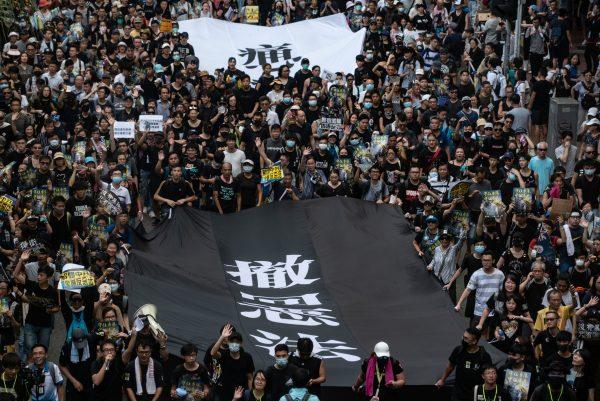 Protesters attend a rally against a controversial extradition law proposal in Sha Tin district of Hong Kong on July 14, 2019. (PHILIP FONG/AFP/Getty Images)