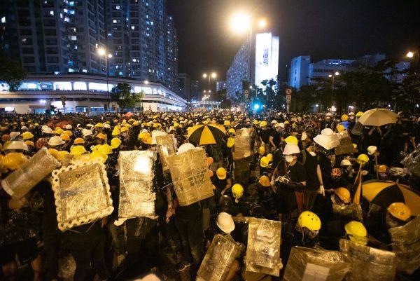 Protesters occupy the main road of the district during a rally against a controversial extradition law proposal in Sha Tin district of Hong Kong on July 14, 2019. (PHILIP FONG/AFP/Getty Images)
