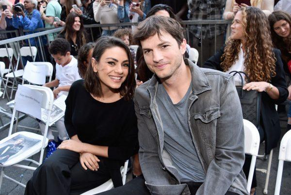 Actors Mila Kunis (L) and Ashton Kutcher at the Zoe Saldana Walk of Fame Star Ceremony in Hollywood, Calif., on May 3, 2018. (Alberto E. Rodriguez/Getty Images for Disney)