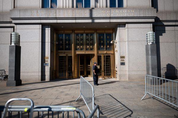 A policeman stands at the courthouse ahead of a bail hearing in US financier Jeffrey Epstein's sex trafficking case in New York City on July 15, 2019. (Johannes Eisele/AFP/Getty Images)