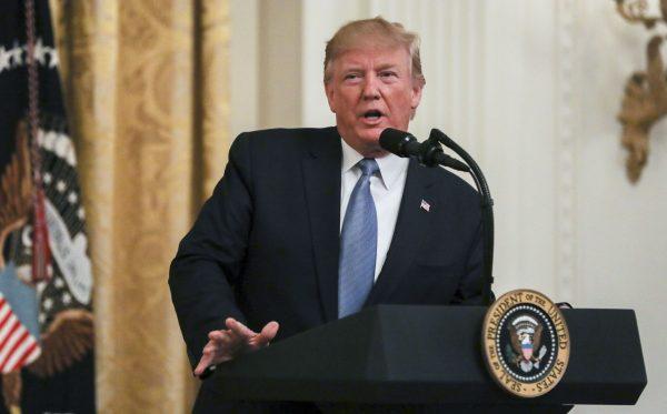President Donald Trump speaks about his administration's environmental initiatives in the East Room of the White House in Washington on July 8, 2019. (Charlotte Cuthbertson/The Epoch Times)