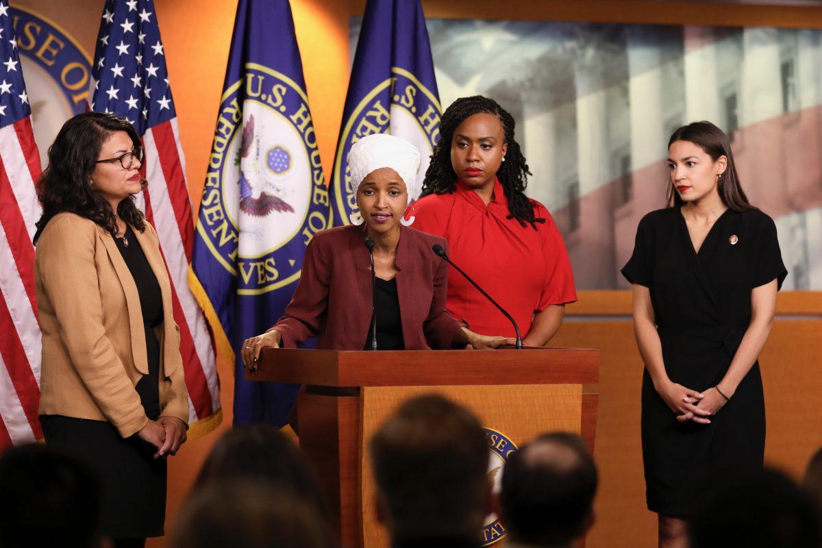 Reps. Alexandria Ocasio-Cortez (D-N.Y.), Ilhan Omar (D-Minn.), Ayanna Pressley (D-Mass.), and Rashida Tlaib (D-Mich.) speak at a press conference at the U.S. Capitol on July 15, 2019. (Holly Kellum/NTD)