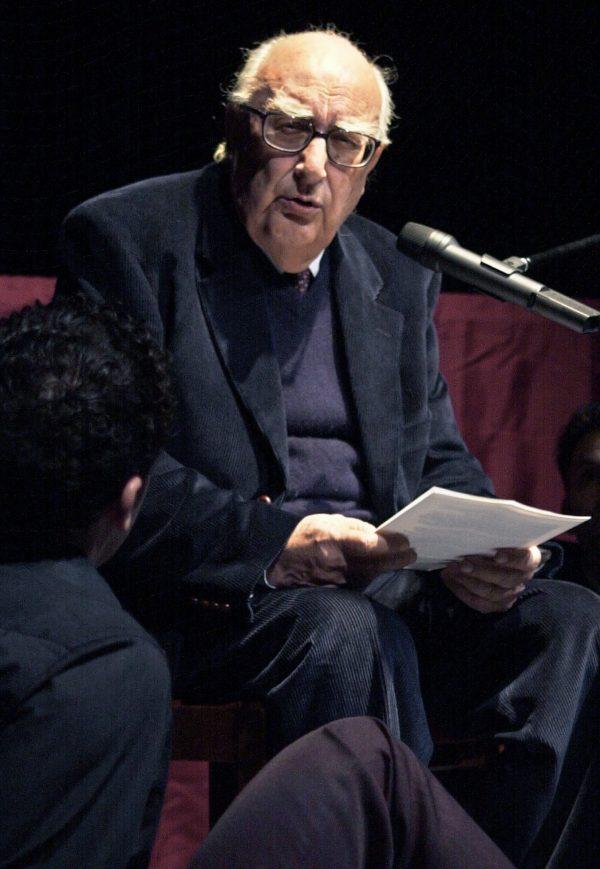 Italian author Andrea Camilleri reads a Luigi Priandello novel at Rome's Piccolo Eliseo theater on March 5, 2001. (Gregorio Borgia/File Photo via AP)