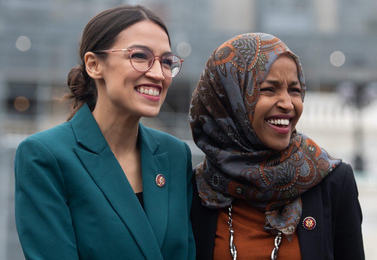 Alexandria Ocasio-Cortez, and Ilhan Omar attend a press conference outside the US Capitol in Washington on Feb. 7, 2019. (Saul Loeb/AFP/Getty Images)