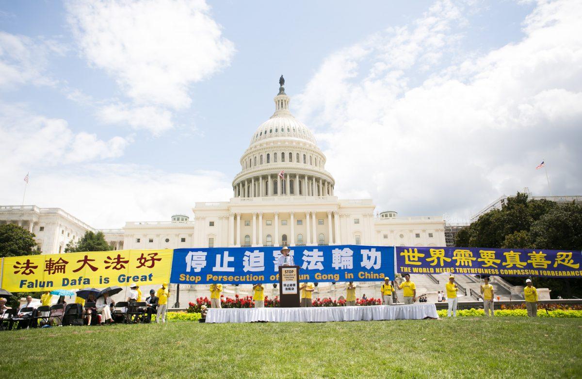 Thousands of Falun Gong practitioners gathered for a rally on the 20th anniversary of the Chinese regime's persecution of the spiritual discipline in Washington, on July 18, 2019. (Li Sha/The Epoch Times)