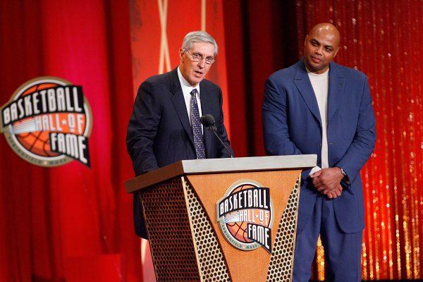 Charles Barkley presents Coach Jerry Sloan to the Naismith Memorial Basketball Hall of Fame during an induction ceremony in Springfield, Massachusetts on Sept. 11, 2009. (Jim Rogash/Getty Images)