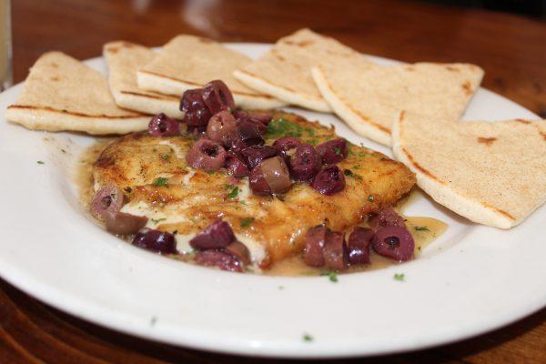 Saganaki at George's Greek Cafe in Long Beach. (Courtesy of Beach City Food Tours)