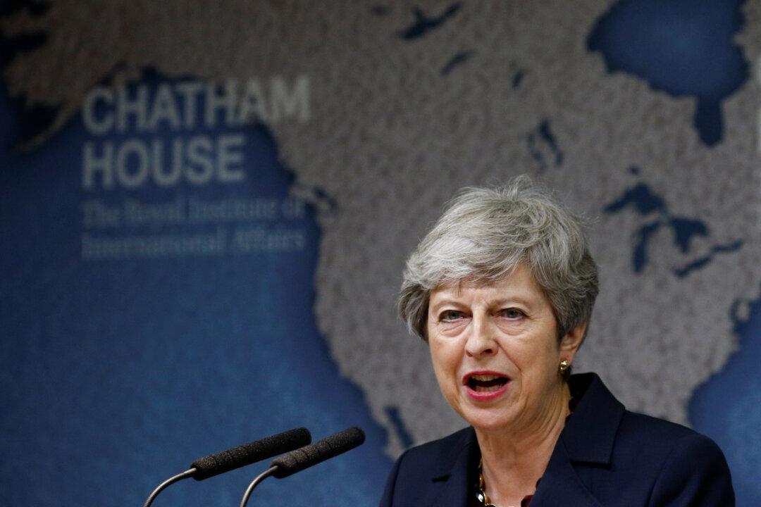 Outgoing UK Prime Minister May Reiterates Commitment to Sino-UK Joint Declaration