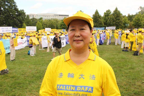 Falun Gong practitioner Wang Shaohua at a rally before marching towards the Washington Monument on July 18, 2019. (Eva Fu/The Epoch Times)