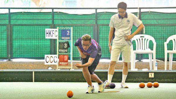 Hong Kong Football Club bowler Patrick Choi (back) in deep thought during his match against Jordi Lo (delivering) from Craigengower Cricket Club in the final of the National Indoor Singles last Saturday, July 13. Lo won in straight sets to claim the title. (Mike Worth)