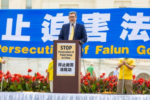 Benedict Rogers, East Asia team leader at nonprofit Christian Solidarity Worldwide, at a rally commemorating the 20th anniversary of the persecution of Falun Gong in China, on the West Lawn of Capitol Hill in Washington on July 18, 2019. (Mark Zou/The Epoch Times)