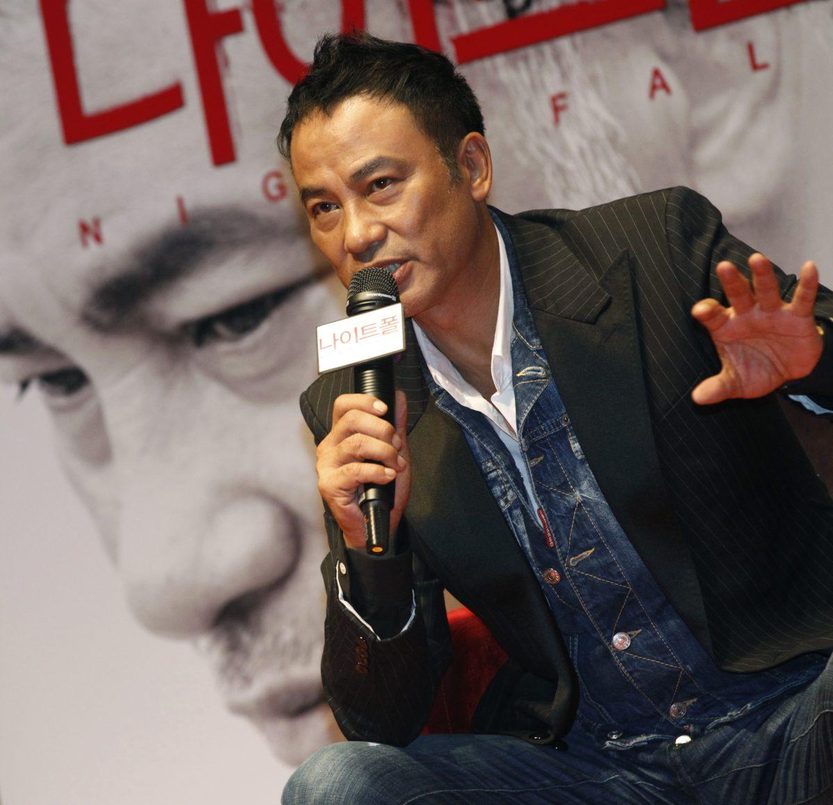 Hong Kong actor Simon Yam speaks during a news conference to promote his movie "Nightfall" in Seoul, South Korea, on Sept. 12, 2012. (Lee Jae-Won/Reuters)
